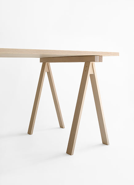 Arkitecture Table by Nikari, showing closeup view of arkitecture table in live shot.