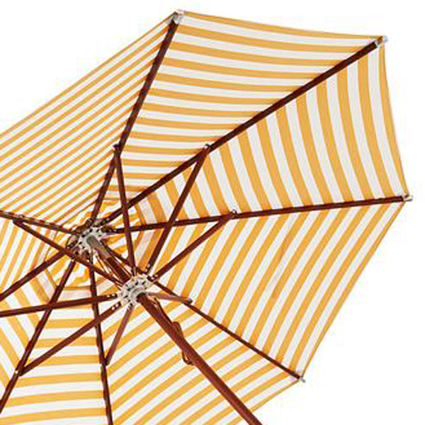 Atlantis Stripes Outdoor Umbrella Ø330 by Skagerak, showing closeup view of atlantis stripes outdoor umbrella in golden yellow stripes fabric.