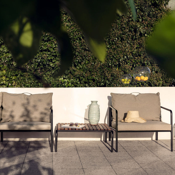 Avon Outdoor Lounge Table by Houe, showing avon outdoor lounge table in live shot.