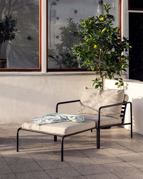 Avon Outdoor Ottoman by Houe, showing avon outdoor ottoman in live shot.