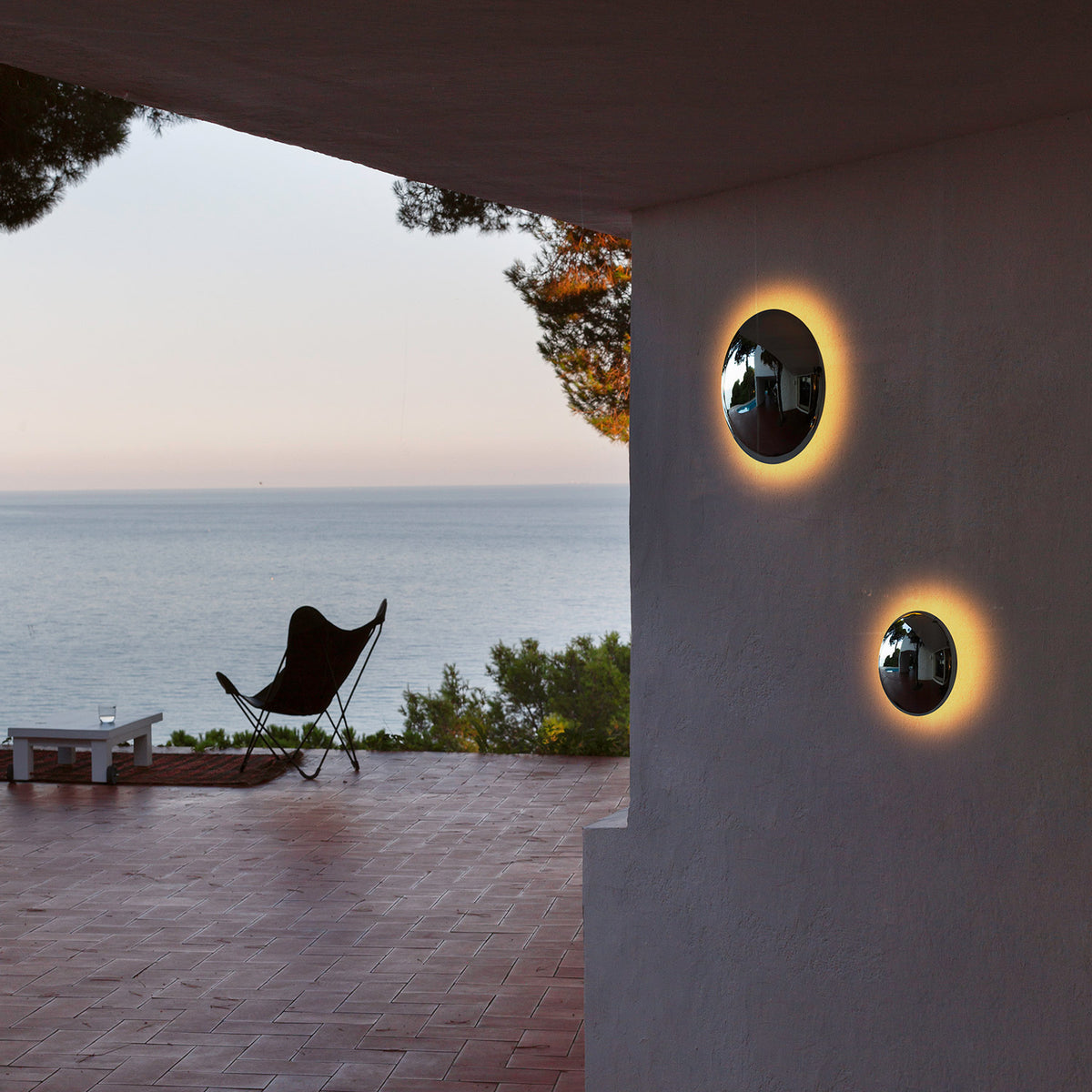 Babila Outdoor Wall Sconce by Marset, showing babila outdoor wall sconces in live shot.