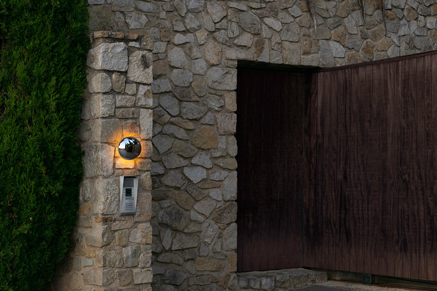 Babila Outdoor Wall Sconce by Marset, showing babila outdoor wall sconce in live shot.