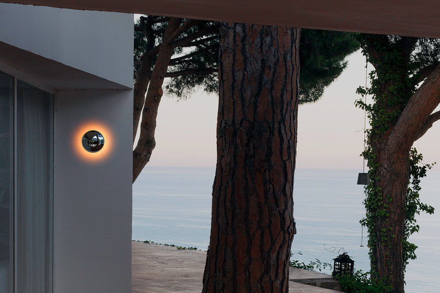 Babila Outdoor Wall Sconce by Marset, showing babila outdoor wall sconce in live shot.