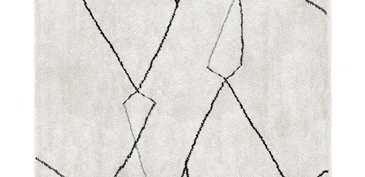 Bagnolo In Piano BO202 Rug by Second Studio, showing closeup view of bagnolo in piano bo202 rug by second studio in off white/grey & black.