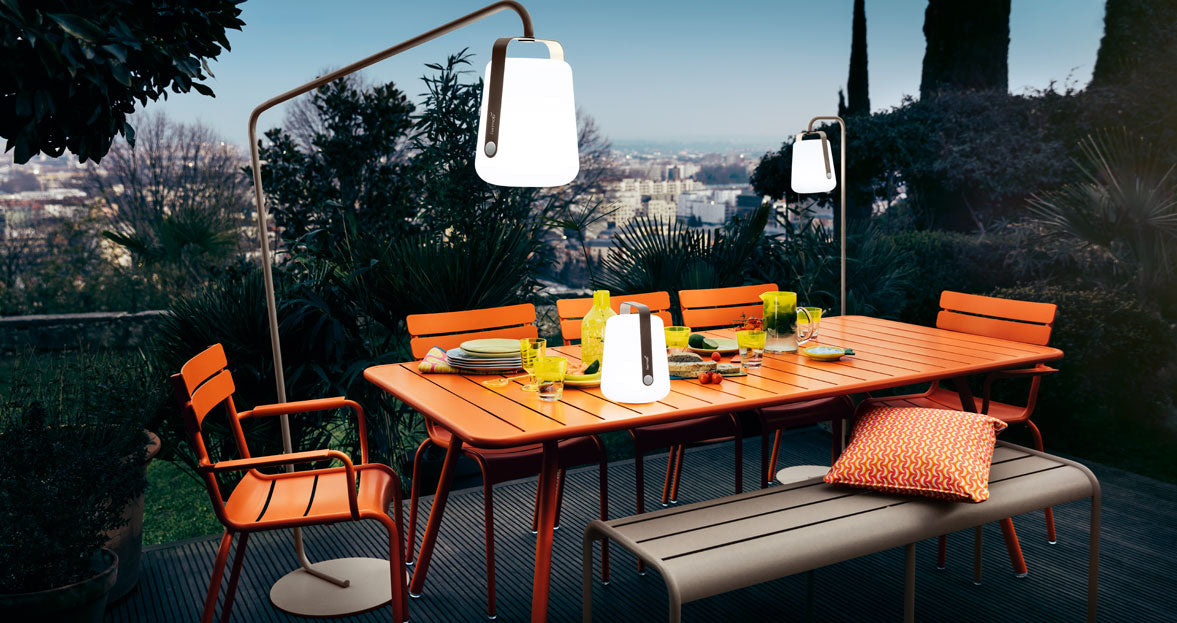 Balad Upright Small Stand by Fermob, showing of small stand with table in the live shot.