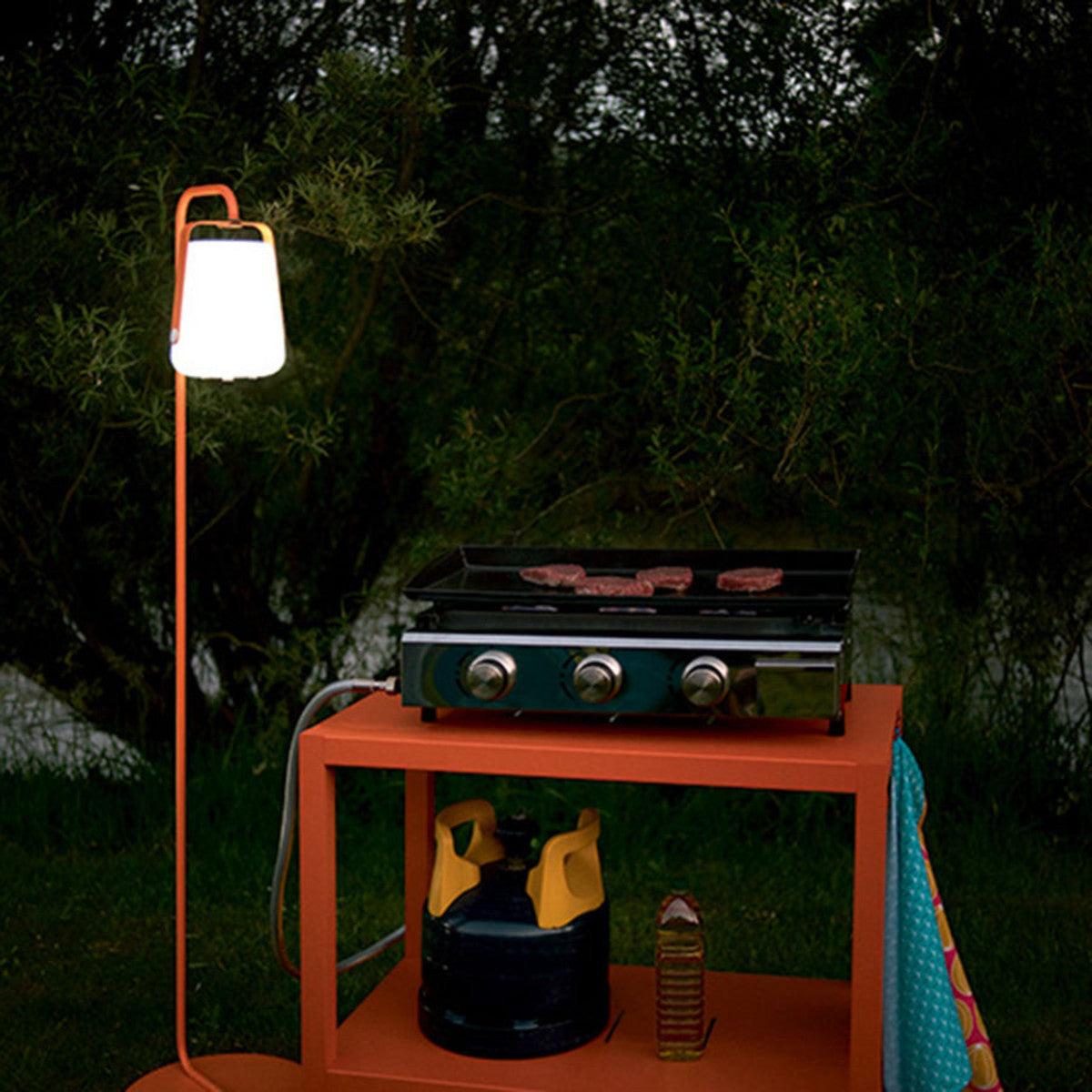 Balad Upright Small Stand by Fermob, showing of small stand with table in the live shot.