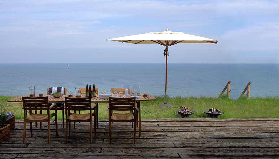Ballare Chair by Skagerak, showing chairs with dining table in live shot.