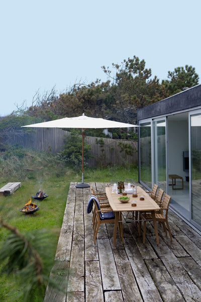 Ballare Chair by Skagerak, showing chairs with dining table in live shot.