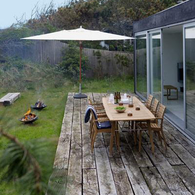 Ballare Table by Skagerak, showing ballare table with chairs in live shot.
