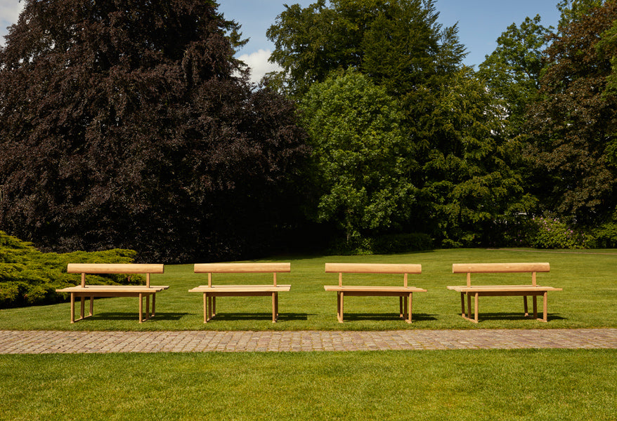 Banco Outdoor Bench by Skagerak, showing banco outdoor bench in live shot.