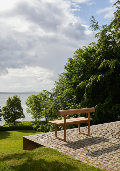 Banco Outdoor Bench by Skagerak, showing banco outdoor bench in live shot.