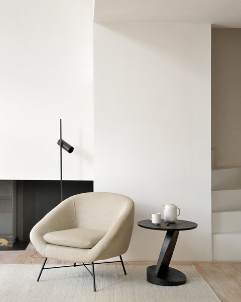 Barrow Lounge Chair by Ethnicraft, showing lounge chair with table in the live shot.