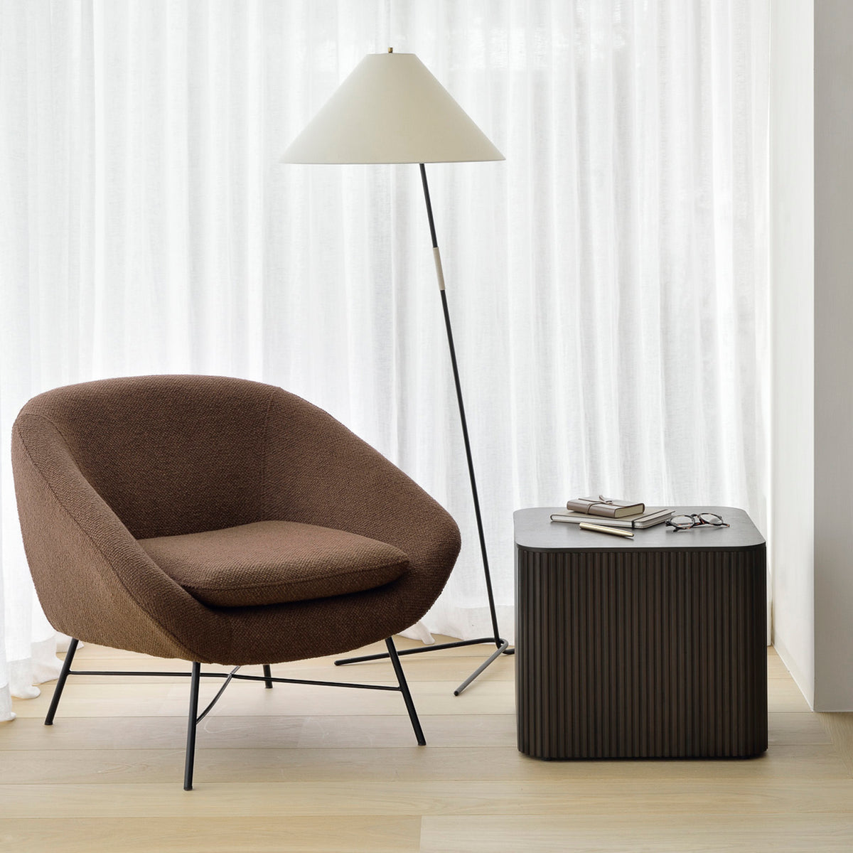 Barrow Lounge Chair by Ethnicraft, showing lounge chair with table in the live shot.