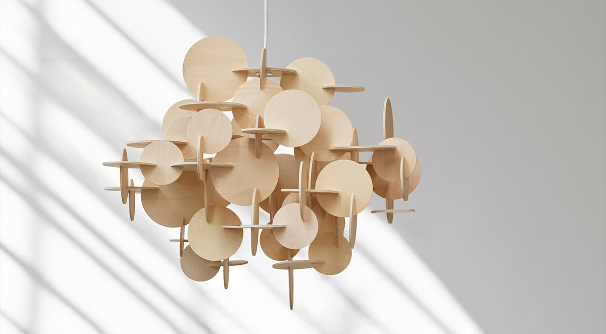 Bau US Pendant Lamp by Normann Copenhagen, showing bau us pendant lamps in live shot.