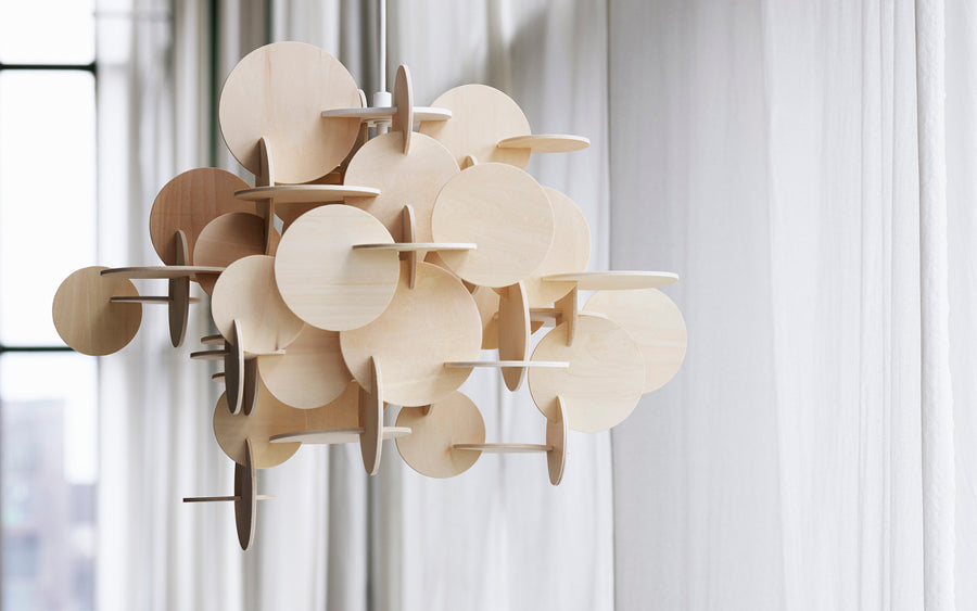 Bau US Pendant Lamp by Normann Copenhagen, showing bau us pendant lamps in live shot.