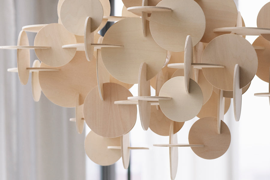Bau US Pendant Lamp by Normann Copenhagen, showing closeup view of bau us pendant lamps in live shot.