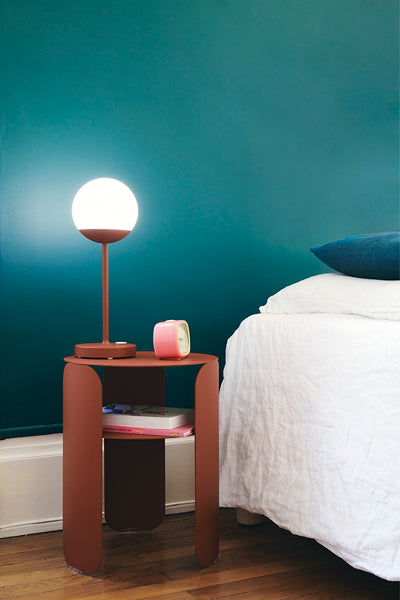 Bebop Side Table with Shelf by Fermob, showing bebop side table in live shot.