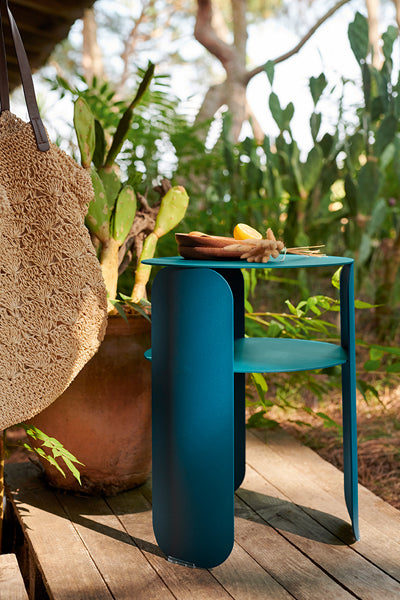 Bebop Side Table with Shelf by Fermob, showing bebop side table in live shot.