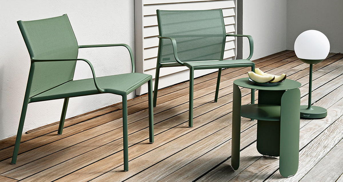 Bebop Side Table with Shelf by Fermob, showing bebop side table in live shot.