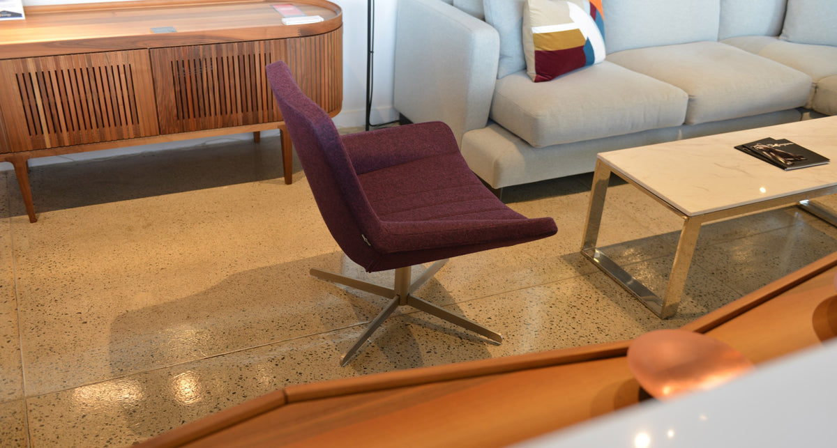 Bellagio 4 Star Armchair by SohoConcept, showing side view of 4 star armchair in live shot.
