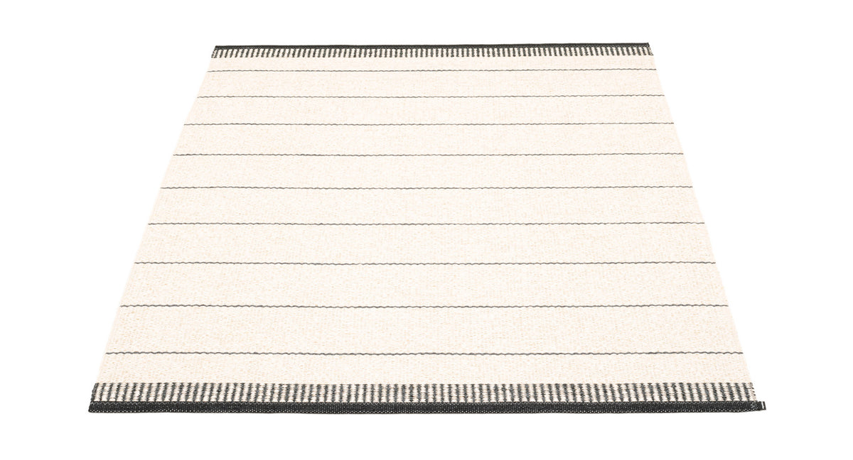 Belle Black Runner Rug by Pappelina, showing front view of belle black runner rug.