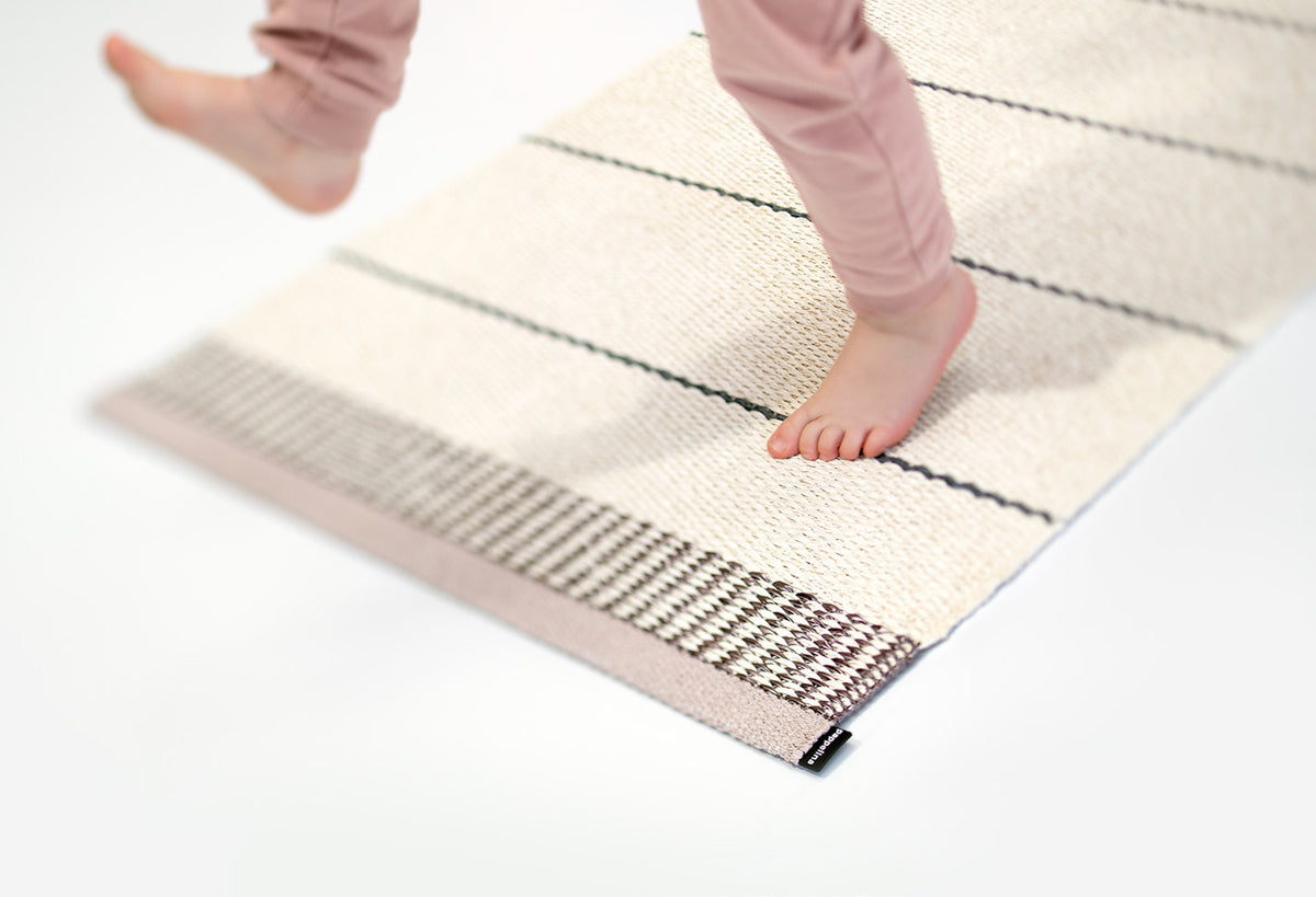 Belle Pale Rose Runner Rug by Pappelina, showing belle pale rose runner rug in studio shot.