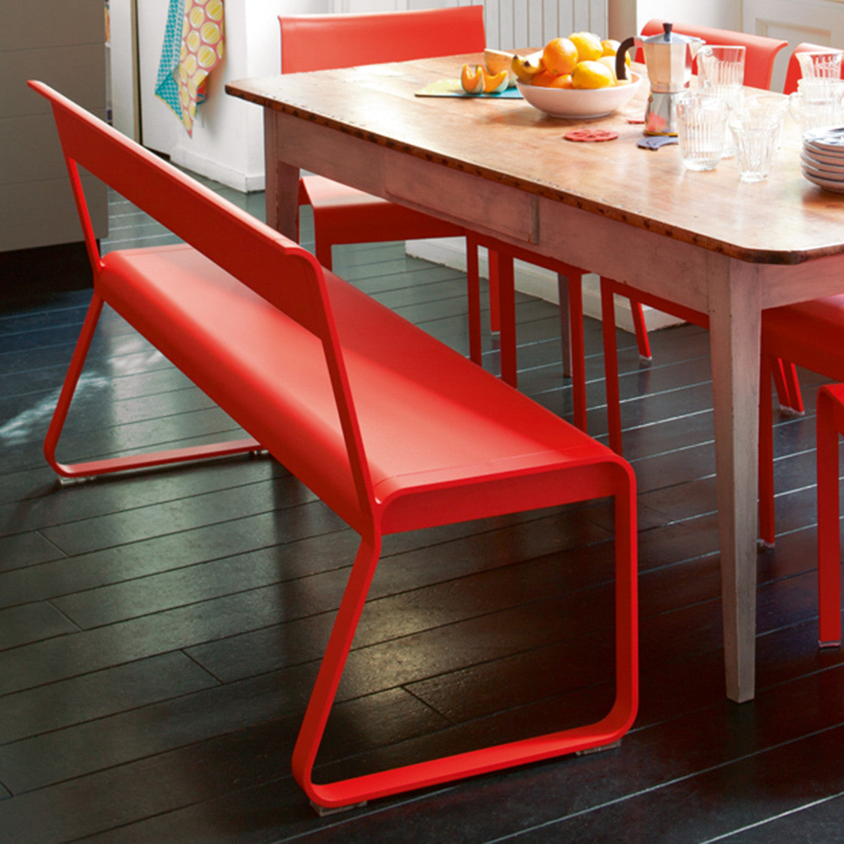 Bellevie Bench with Back by Fermob, showing of bellevie bench with back and table in live shot.