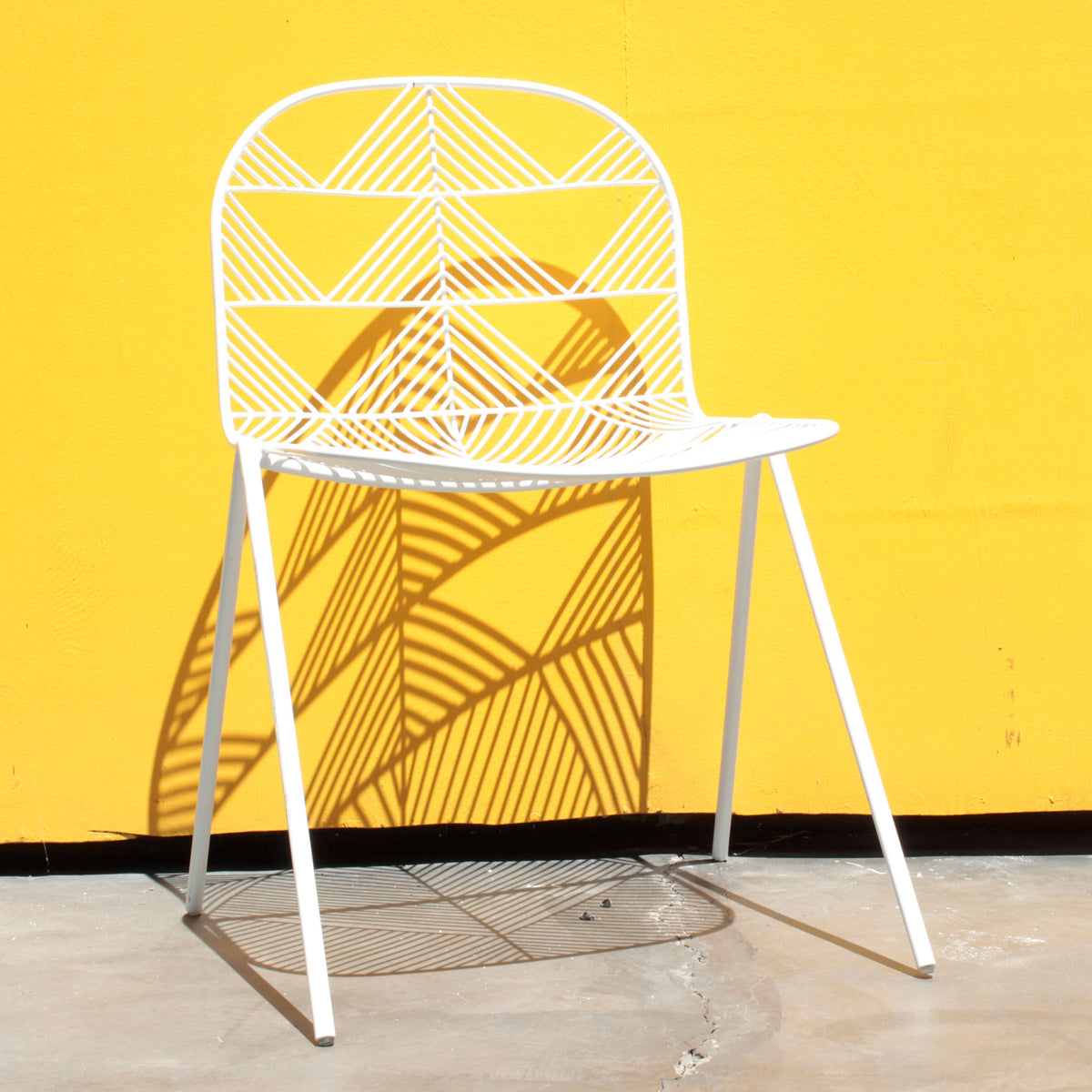Betty Stacking Chair by Bend, showing betty stacking chair in live shot.