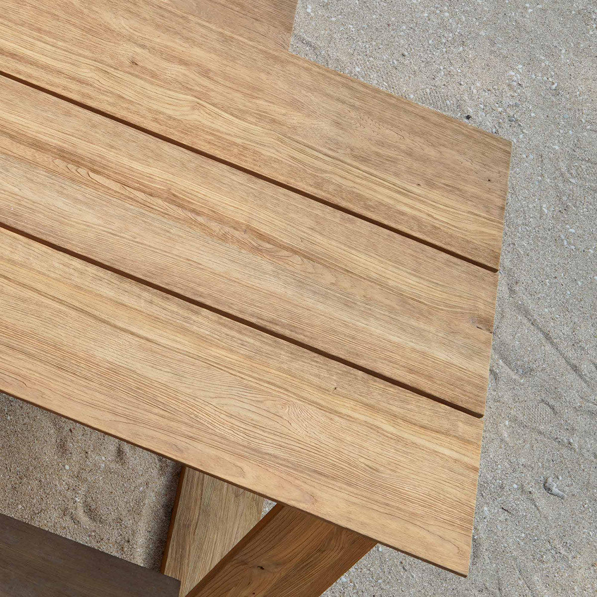 Big Daddy Slats Table by Mamagreen, showing closeup view of big daddy slats table in live shot.
