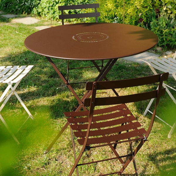 Bistro Metal Chair by Fermob, showing metal chairs with table in live shot.