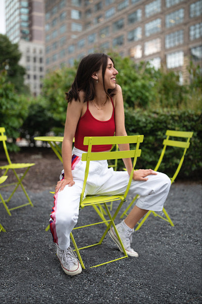 Bistro Metal Chair by Fermob, showing bistro metal chairs with table in live shot.