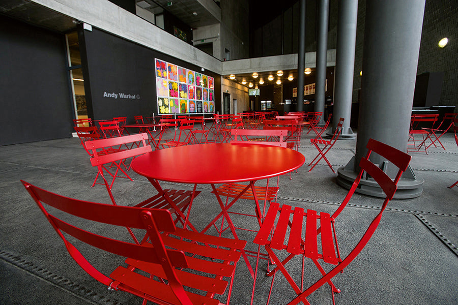 Bistro Round Tables by Fermob, showing live shoot of the table with chairs.