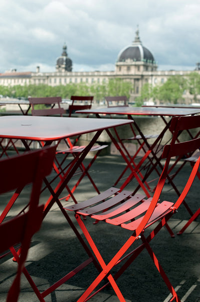 Bistro Tables by Fermob, showing back view of the table with chairs.
