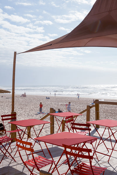 Bistro Tables by Fermob, showing live shoot of the table with chairs.