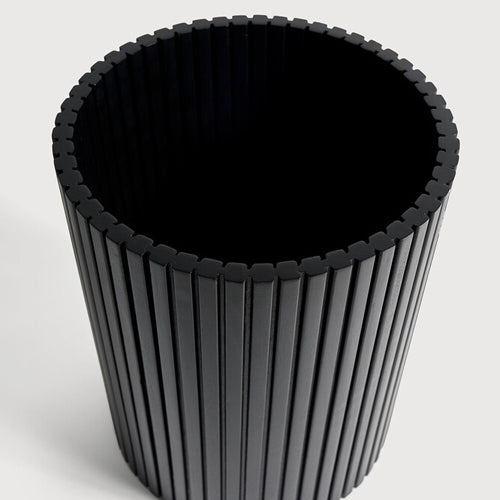 Black Waste Paper Basket by Ethnicraft, showing closeup view of basket.