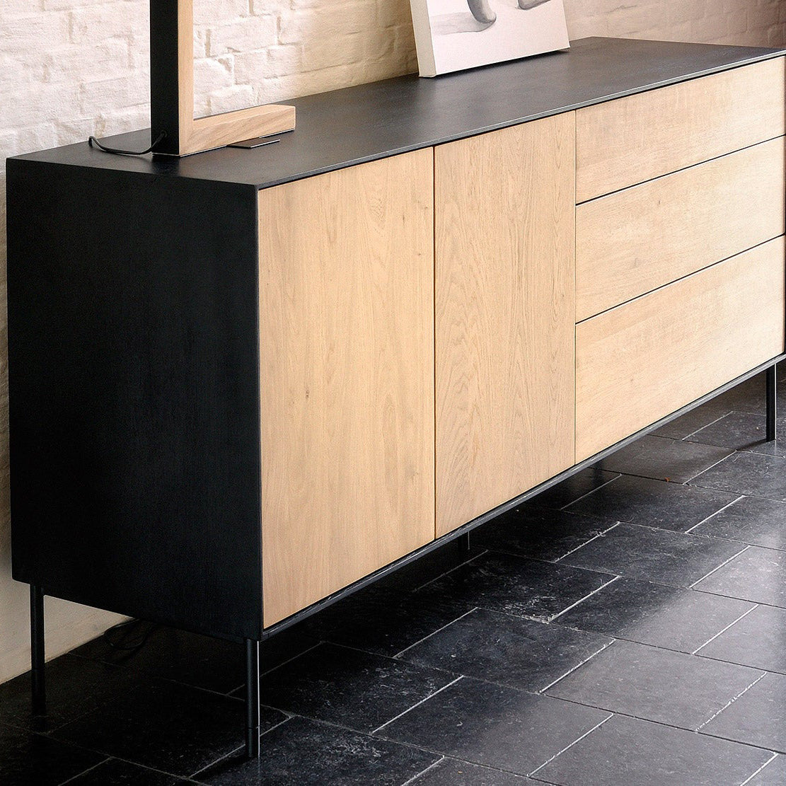 Blackbird Oak Sideboard by Ethnicraft, showing blackbird oak sideboard in live shot.
