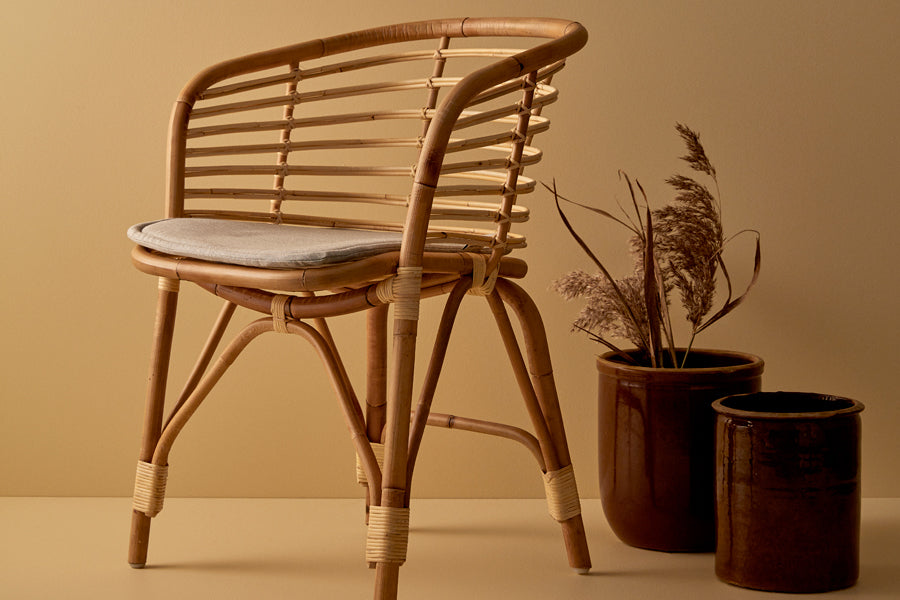Blend Indoor Armchair by Cane-Line, showing blend indoor armchair in live shot.