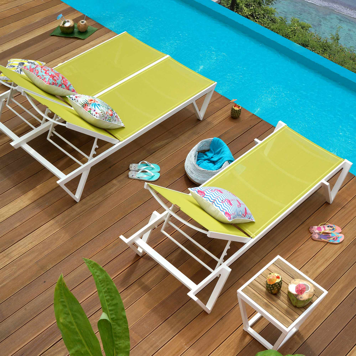 Bondi Ledge Stackable Sling Sunbed by Mamagreen, showing bondi ledge stackable sling sunbed with double sunbed & table in live shot.