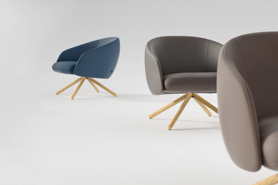Bonny Swivel Lounge Chair by B&T, showing bonny swivel lounge chairs in live shot.