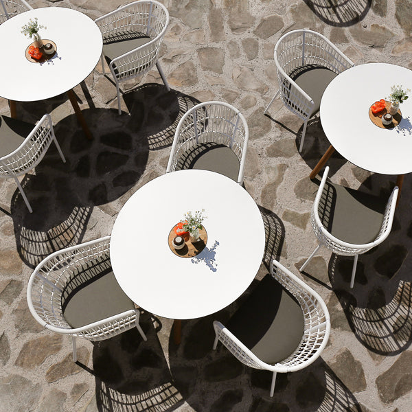 Bono Teak Dining Table by Mamagreen, showing bono teak dining tables with dining chairs in live shot.