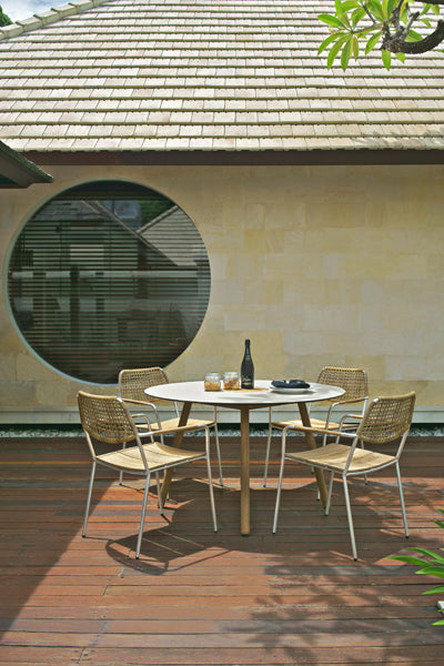 Bono Teak Dining Table by Mamagreen, showing bono teak dining table with dining chairs in live shot.