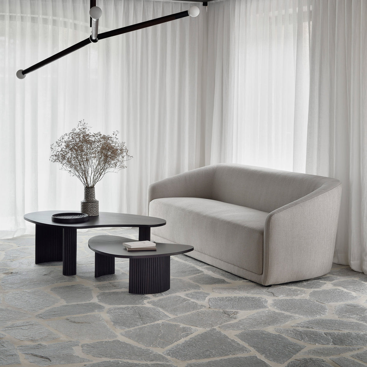 Boomerang Coffee Table by Ethnicraft, showing boomerang coffee tables in live shot.