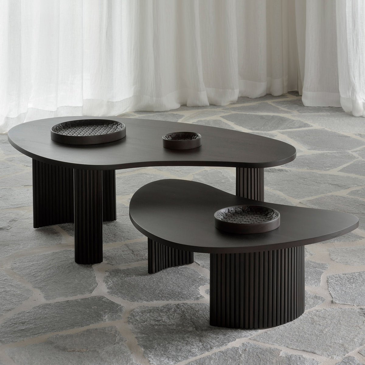 Boomerang Coffee Table by Ethnicraft, showing boomerang coffee tables in live shot.