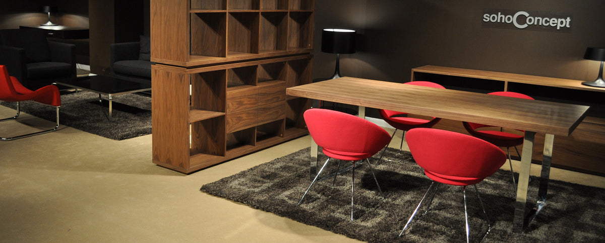 Bosphorus Dining Table by SohoConcept, showing bosphorus dining table with chairs, & bookcase in live shot.