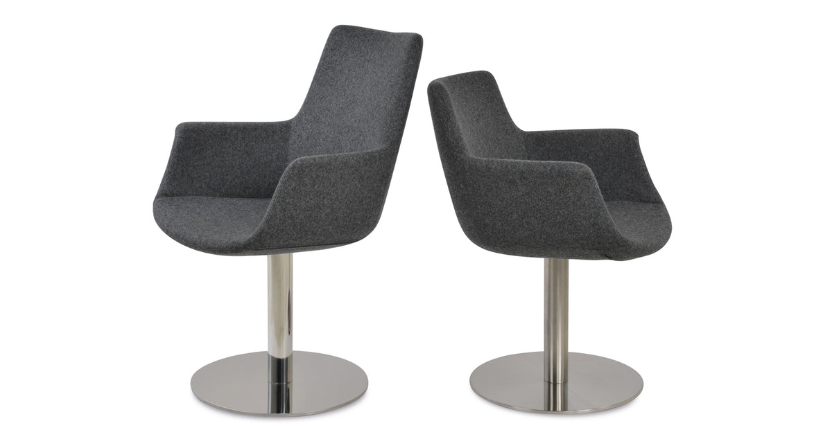 Bottega Round Swivel Armchair by SohoConcept, showing angle view of two arm round swivel chairs (low/high back) in Camira Blazer Dark Grey Wool.