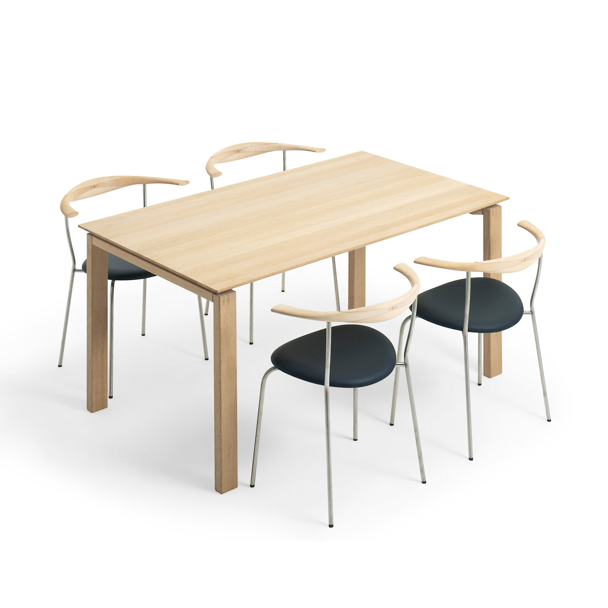 BPS Dining Table No. 175 by Bernh. Pedersen & Son, showing angle view of bps dining table no. 175 in solid oak top with chairs.
