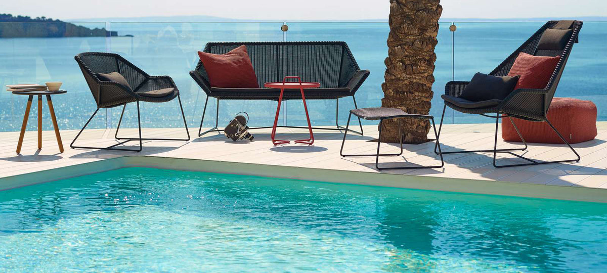 Breeze 2 Seater Lounge Sofa by Cane-Line, showing breeze 2-seater lounge sofa in live shot.
