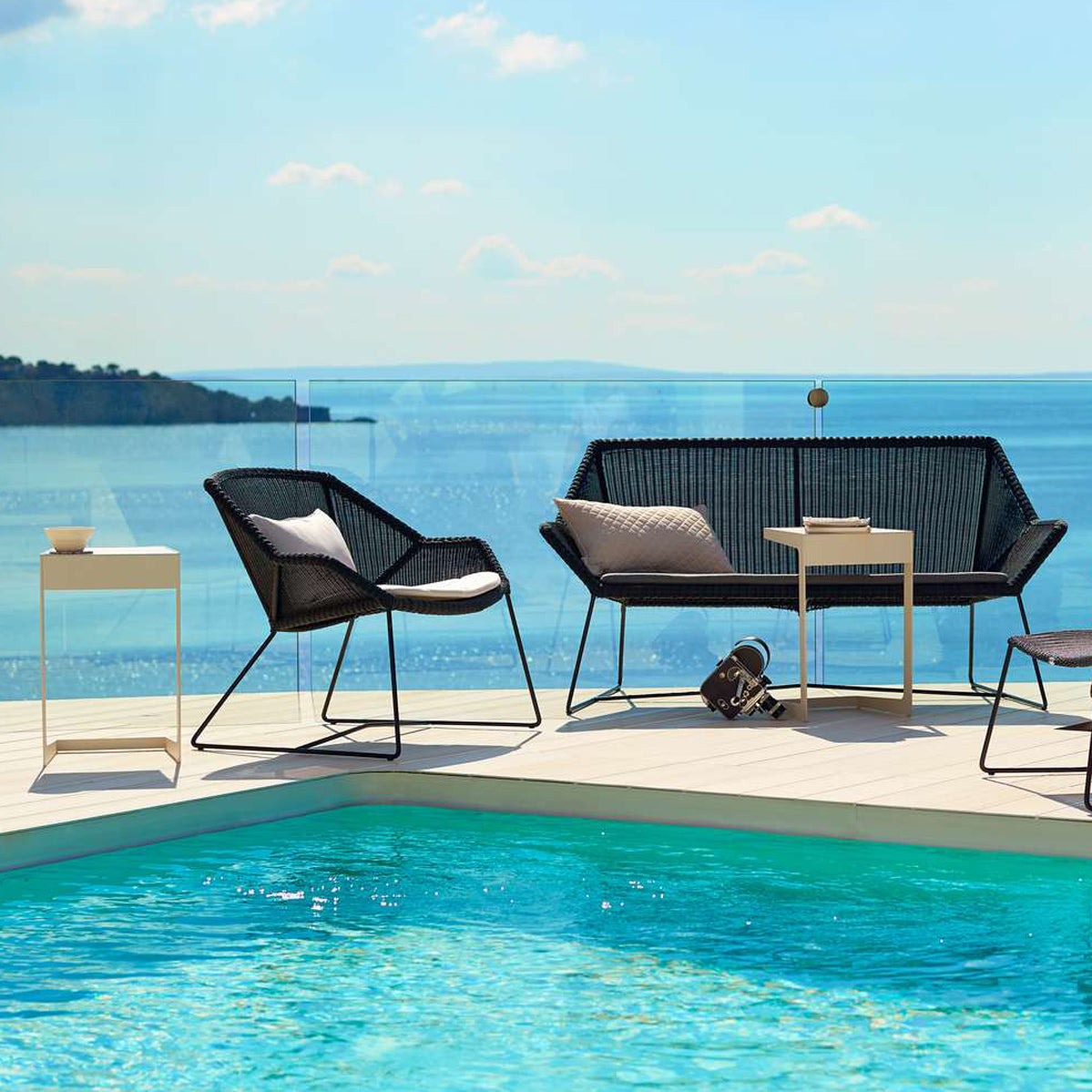 Breeze 2 Seater Lounge Sofa by Cane-Line, showing breeze 2-seater lounge sofa in live shot.