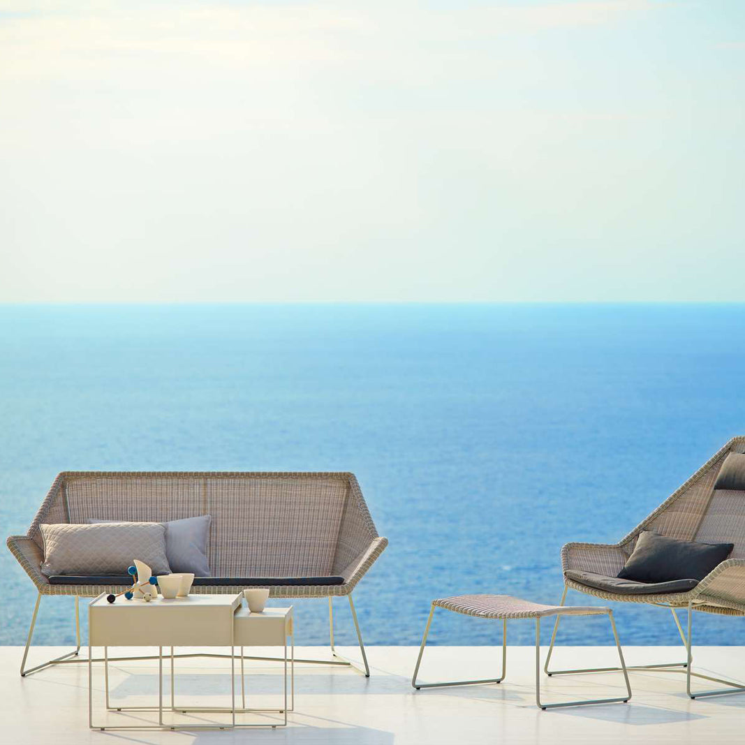 Breeze 2 Seater Lounge Sofa by Cane-Line, showing breeze 2-seater lounge sofa in live shot.