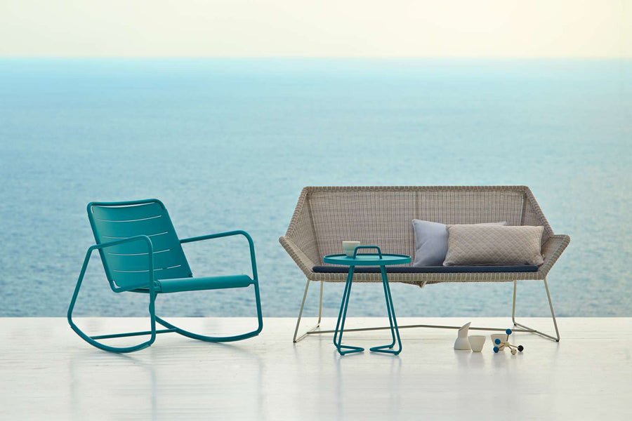 Breeze 2 Seater Lounge Sofa by Cane-Line, showing breeze 2-seater lounge sofa in live shot.